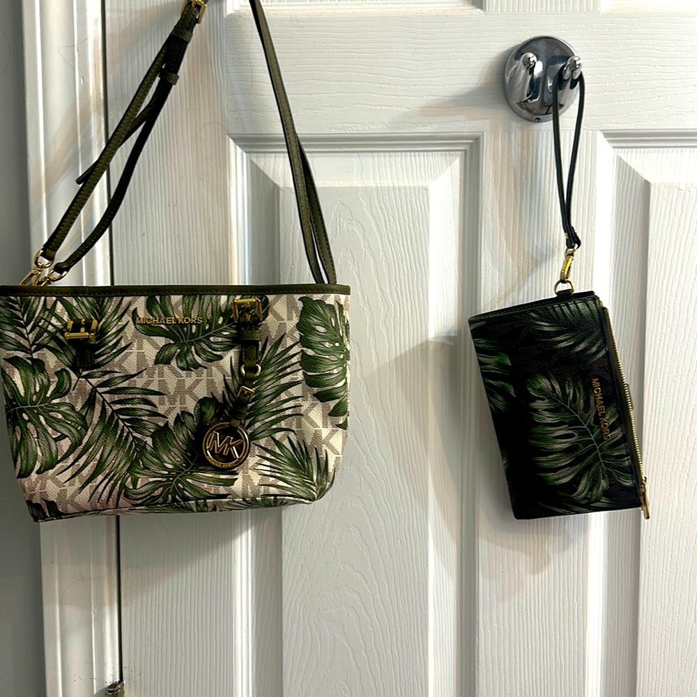 Michael Kors palm leaf tropical print wristlet.